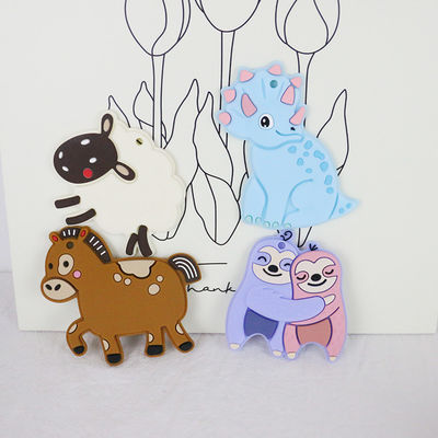 Silicón personalizado bebé colorido Teether con el caballo Dino Shape de las ovejas