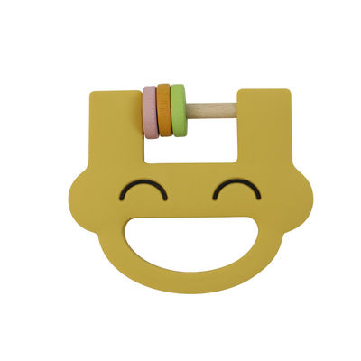El traqueteo lindo Teether del silicón de los juguetes de los niños del silicón de la cara de la sonrisa con modifica el ODM del OEM para requisitos particulares del logotipo