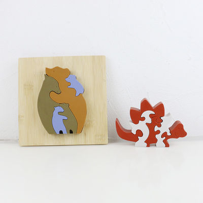 Modifique el rompecabezas del silicón para requisitos particulares, rompecabezas infantiles 3D con la base de bambú de madera