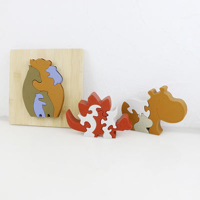 Modifique el rompecabezas del silicón para requisitos particulares, rompecabezas infantiles 3D con la base de bambú de madera