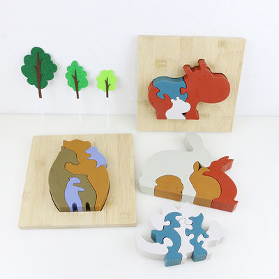 Modifique el rompecabezas del silicón para requisitos particulares, rompecabezas infantiles 3D con la base de bambú de madera