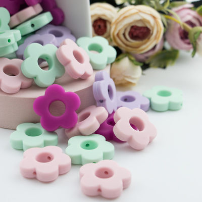 La gota los 4.5cm de la dentición del silicón de los agujeros de la flor para el clip del pacificador de DIY mastica el collar