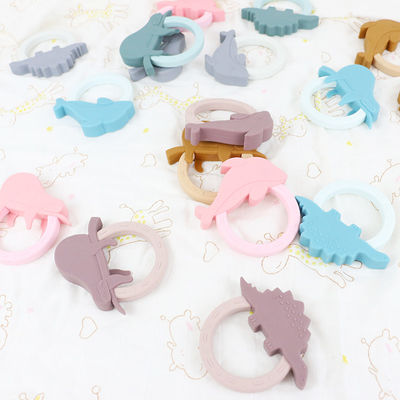 Forma de Teether Toy With Penguin Unicorn Raccoon del bebé del silicón de la historieta