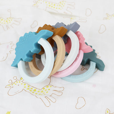 Forma de Teether Toy With Penguin Unicorn Raccoon del bebé del silicón de la historieta