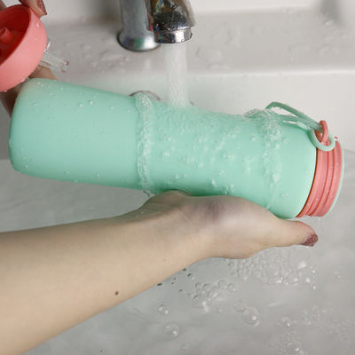 Botella de agua reutilizable del silicón del verde del rosa para el OEM del viaje de los deportes al aire libre
