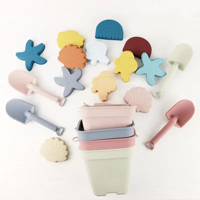 Juguete flotante de la arena de 6 del pedazo del silicón de la playa de Toy Set Bucket Colorful For del agua del entretenimiento del silicón estrellas de mar de los moldes