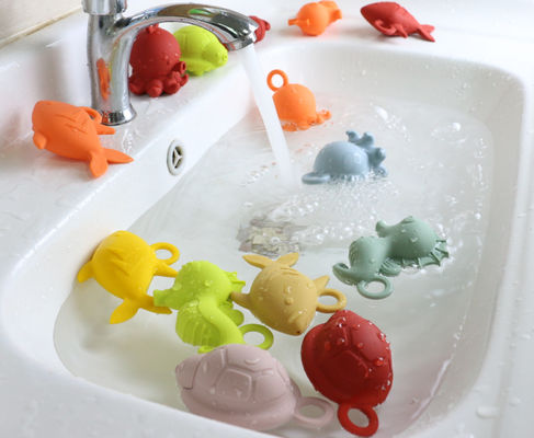 El silicón de goma del bebé de los colores brillantes juega BPA libre para la flotación del agua del bebé