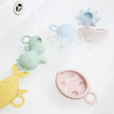 NUEVOS niños de los niños de la llegada que flotan los juguetes libres del agua del silicón de la dentición de la categoría alimenticia del bpa de los juguetes del silicón del baño