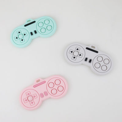 Productos el echar los dientes del bebé - juguetes lindos de encargo de los teethers del silicón de la forma del regulador del jugador de la historieta de los diversos colores lavables