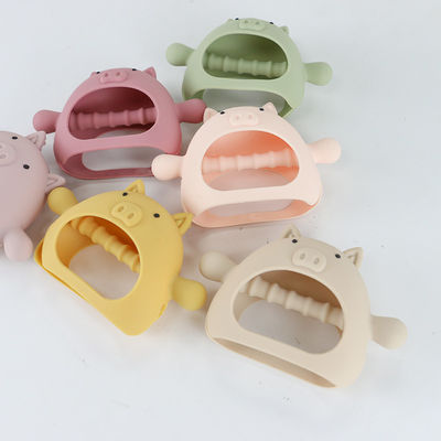 Personalizado Varias formas forma de cerdo agarre de la manija Dientes de silicona para el bebé con varios diseños