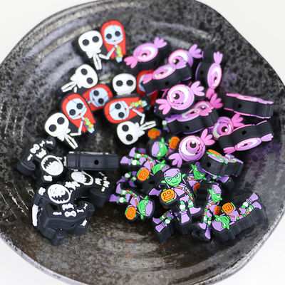La dentición no tóxica de encargo del silicón gotea con el agujero para los focals el echar los dientes del bebé para la Navidad de Halloween