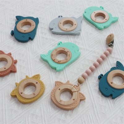 Dientes de bebé de silicona multifunción con anillo de madera de dientes adjustables con patrón animal