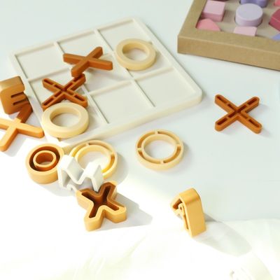Rango de edad 1-4 Silicona Puzles de rompecabezas Promueve el desarrollo cognitivo Educativo Silicona XO Puzzles juguetes