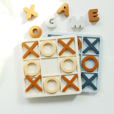 Rango de edad 1-4 Silicona Puzles de rompecabezas Promueve el desarrollo cognitivo Educativo Silicona XO Puzzles juguetes