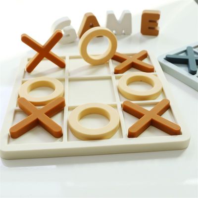 Rango de edad 1-4 Silicona Puzles de rompecabezas Promueve el desarrollo cognitivo Educativo Silicona XO Puzzles juguetes