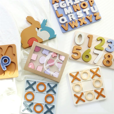Rango de edad 1-4 Silicona Puzles de rompecabezas Promueve el desarrollo cognitivo Educativo Silicona XO Puzzles juguetes