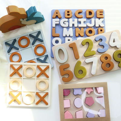 Por mayor Puzzles de silicona XO personalizados con logotipo de marca para bebés