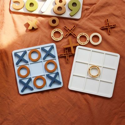 MOQ 50 juegos de silicona XO Tic Tac Puzzle de dedos de pie Logotipo personalizable Colores BPA Libre Certificado CE juguetes de silicona